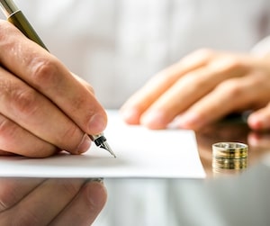 Person signing a contract