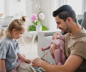 Father and his daughter and baby