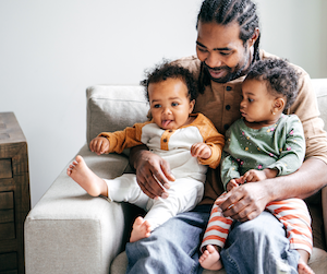 Father with two babies